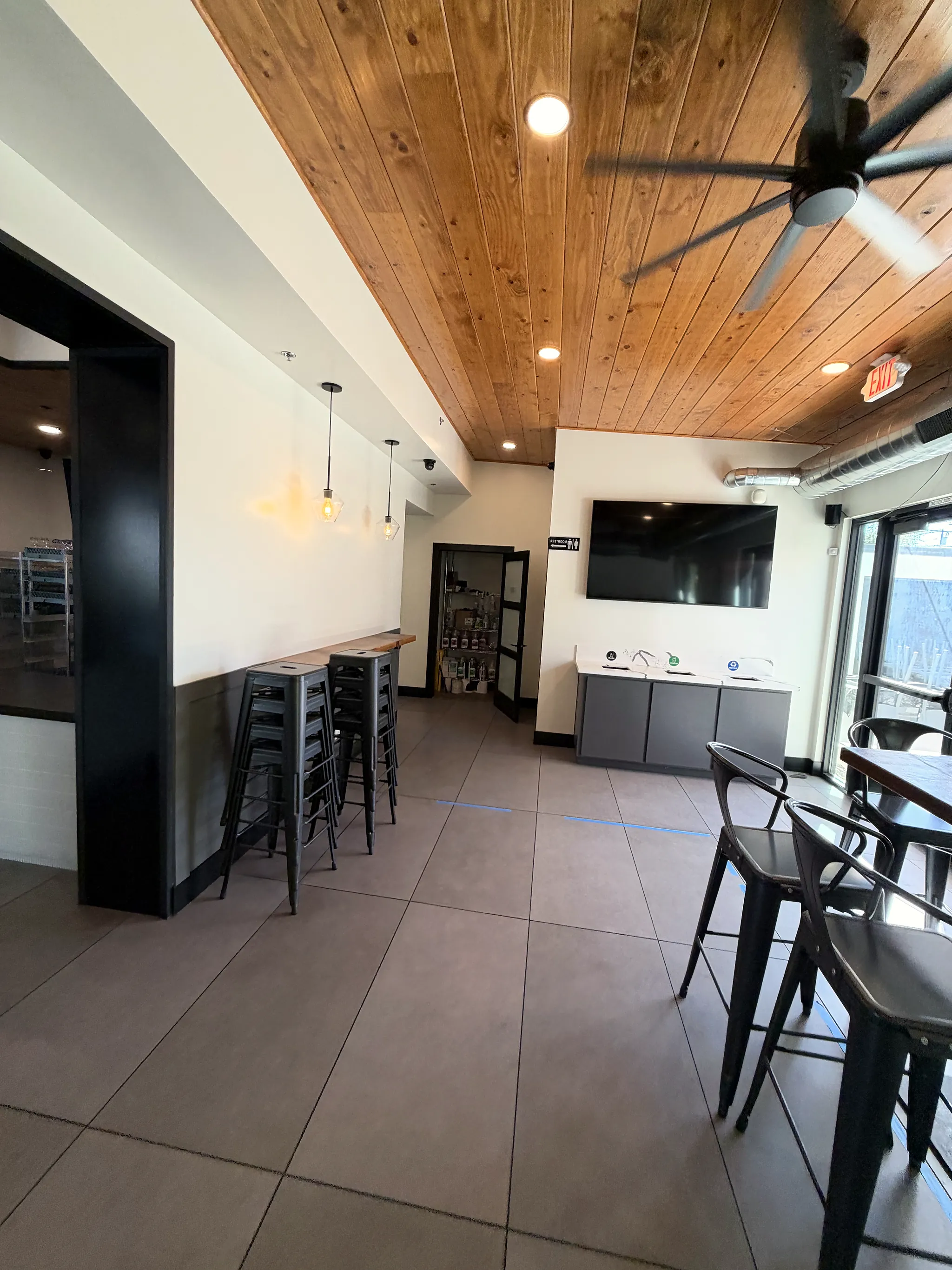 High-top seating under pendant lights